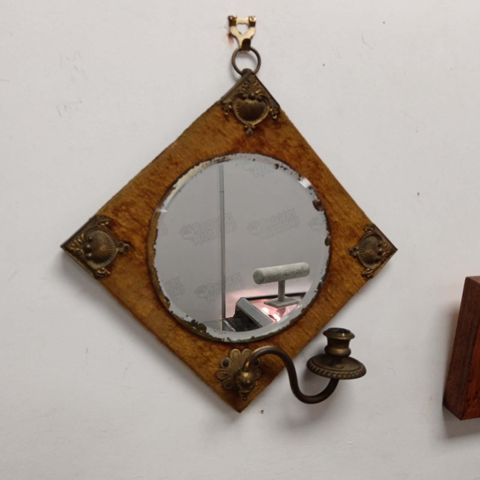 Antique candle wall sconce mirror with brass detailing and diamond frame.