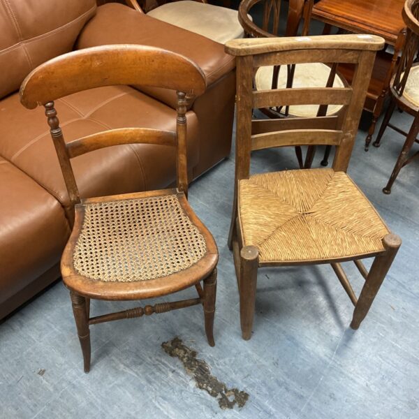 Antique chairs with cane and rush seats, vintage farmhouse style.