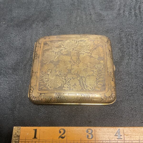 Antique Japanese Komai cigarette case with detailed landscape inlay.