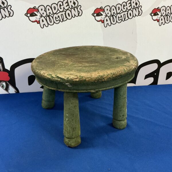 Antique wooden maids stool with four legs, showing age and patina.