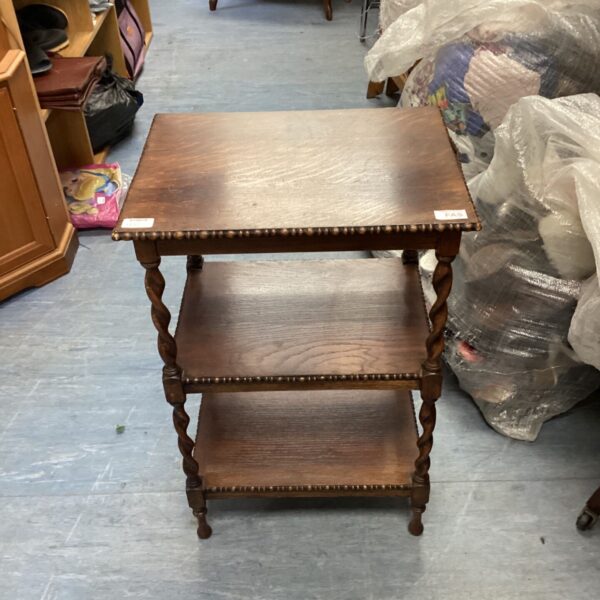 Antique oak whatnot table with barley twist legs.