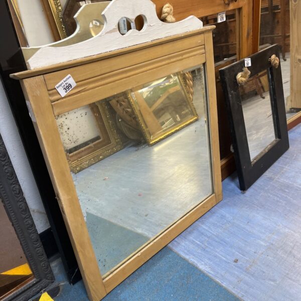 Antique pine mirror with aged frame and silvering loss.