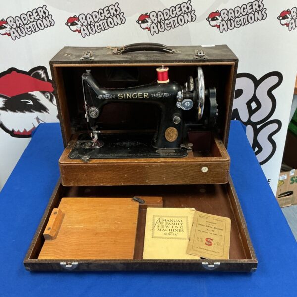 Antique Singer model 99 sewing machine, a vintage collectible.