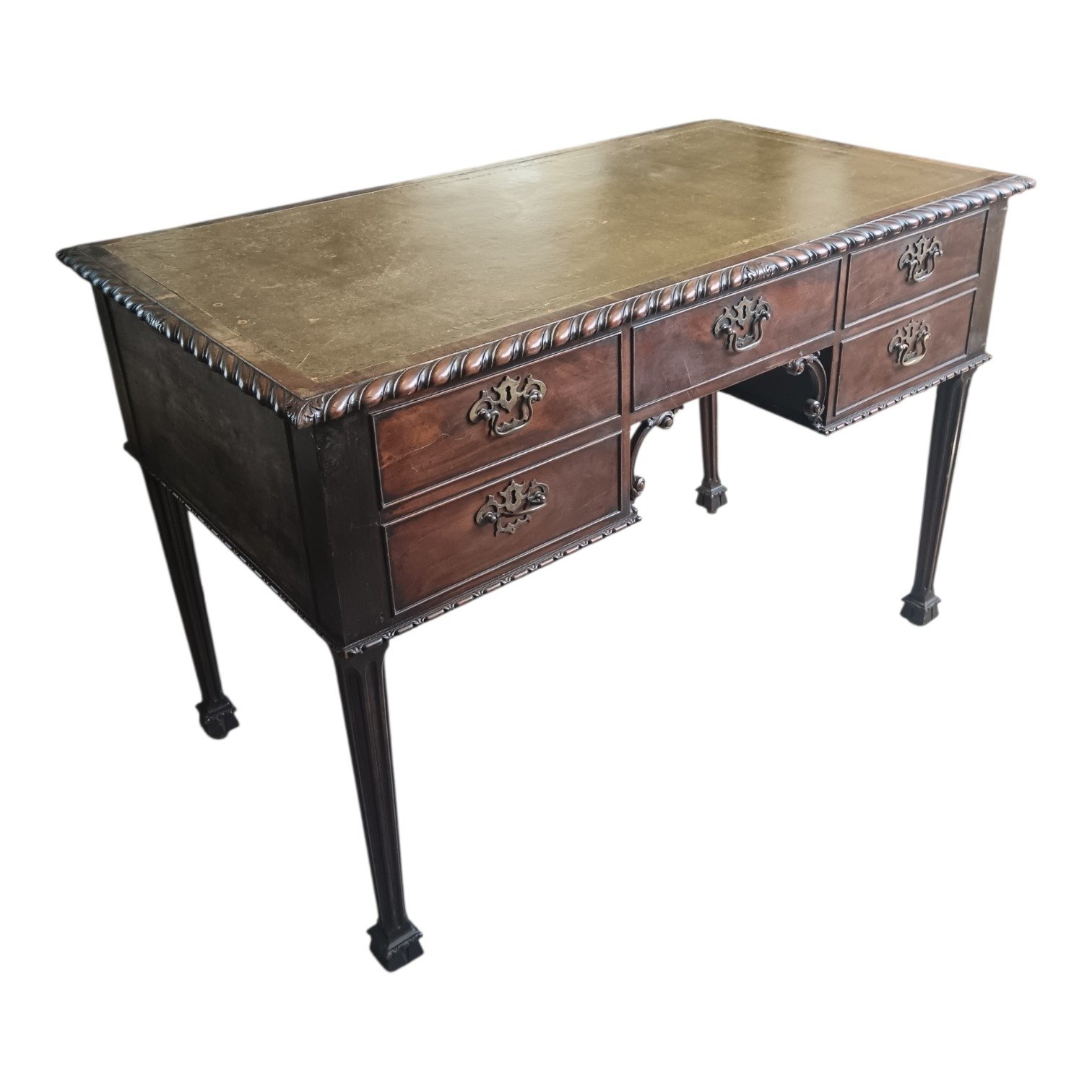 Antique walnut writing desk with green leather top.