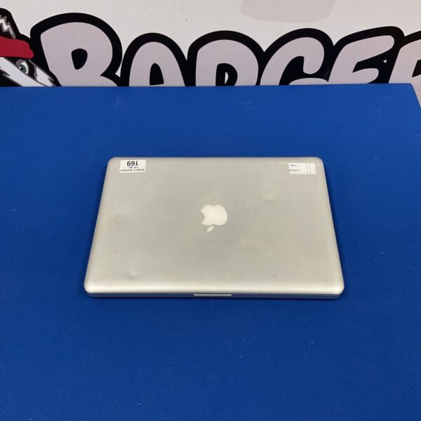 Silver Apple Macbook A1278 laptop, closed view.