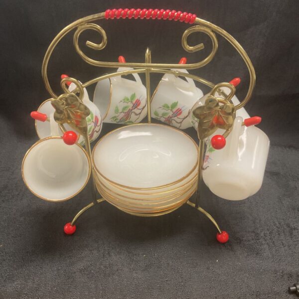 Vintage Arcopal demitasse set with colourful bird design on white opal glass.