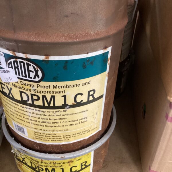Ardex DPM1CR damp proof membrane containers showing product label.