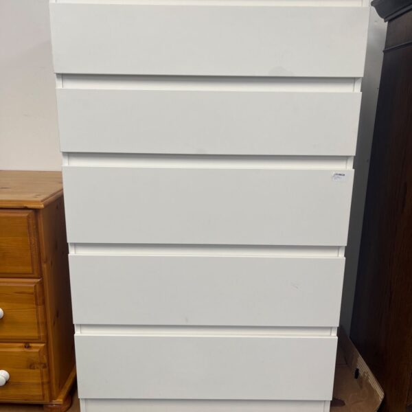 Argos Home Jenson 5 drawer chest in a bedroom setting.