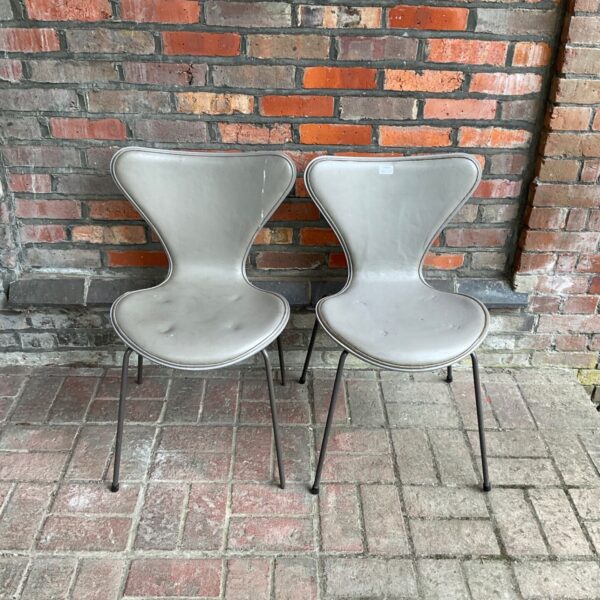 Pair of vintage Arne Jacobsen style chairs with plywood seats.
