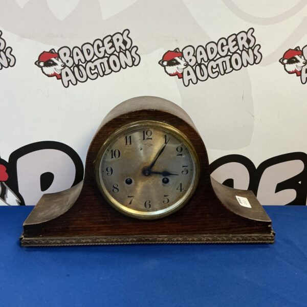 Vintage Art Deco mantle clock with Napoleon hat design.