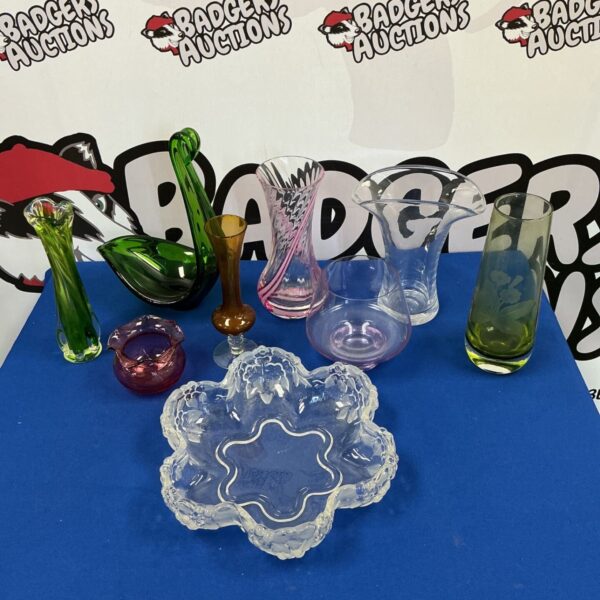 Vibrant art glass bowl with a colourful swirl design.