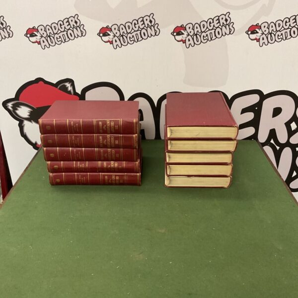 Stack of vintage Arthur Mee children's encyclopaedia books.