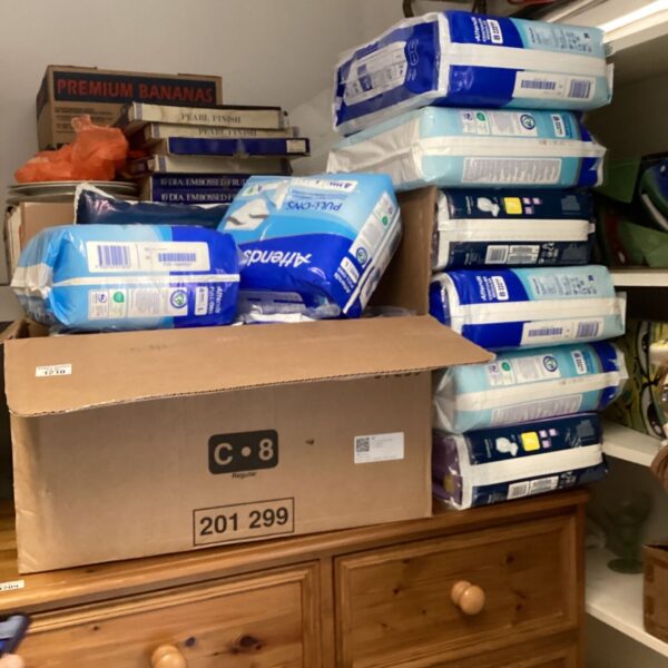 Large bundle of Attends incontinent pants for adult incontinence.