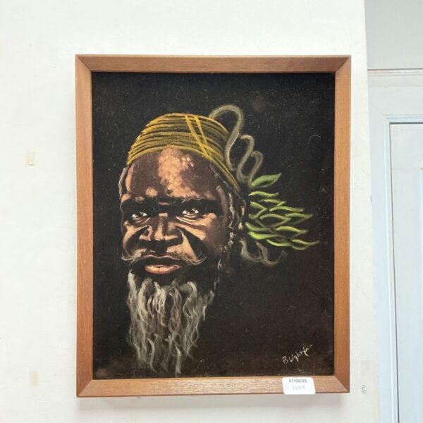 Vintage velvet painting of an African gentleman by B Lightfoot.