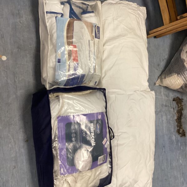 Bedding bundle including pillows, duvet and Miracoil mattress topper.