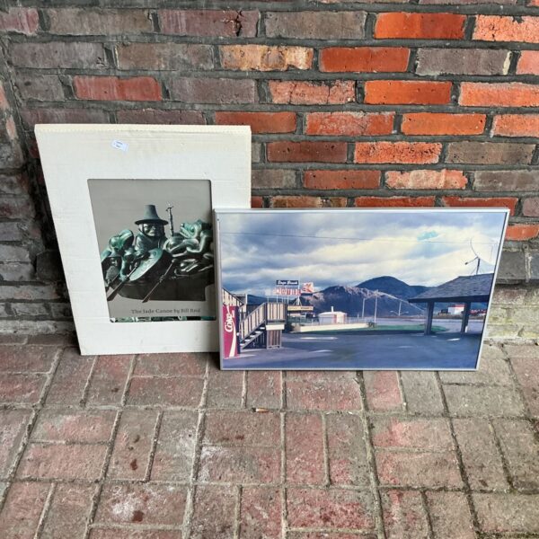 Framed reproduction of Bill Reid’s “The Jade Canoe” print.