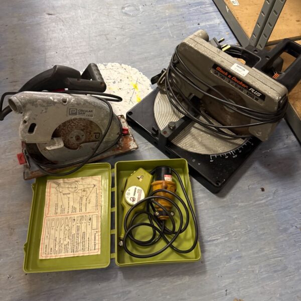 Vintage Black & Decker mitre saw, circular saw, and engraver tool lot.
