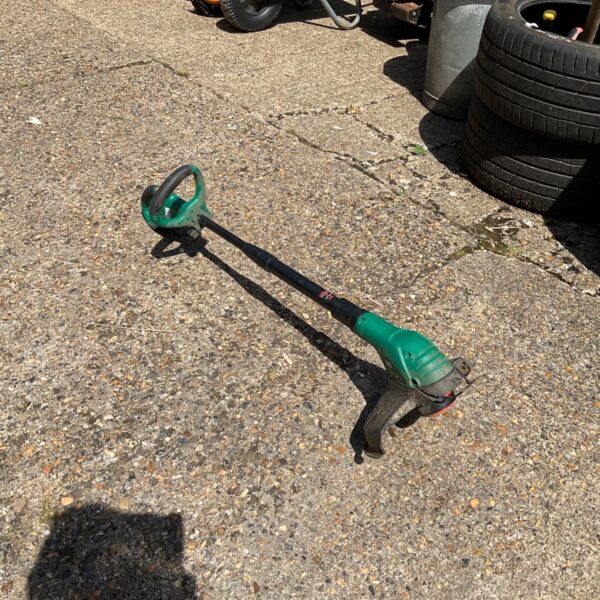 Black and Decker cordless strimmer for garden maintenance and edging.