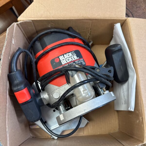 Black & Decker KW850E router, a vintage woodworking power tool.