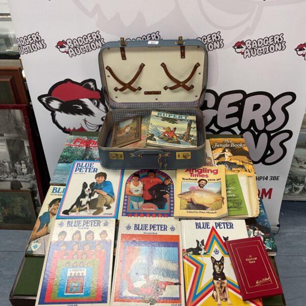 Vintage Blue Peter books and a colourful picnic kit box.