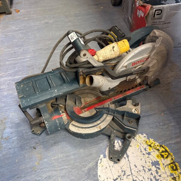 Untested Bosch mitre saw for sale, ideal for DIY projects.