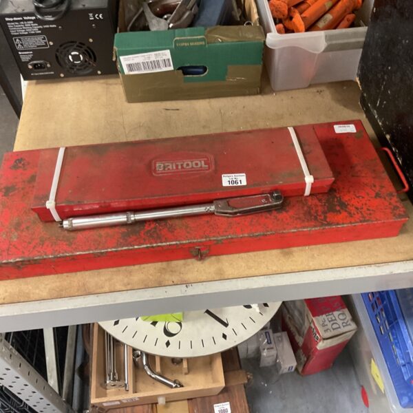 Vintage Britool torque wrench set in a metal case, showing wear.