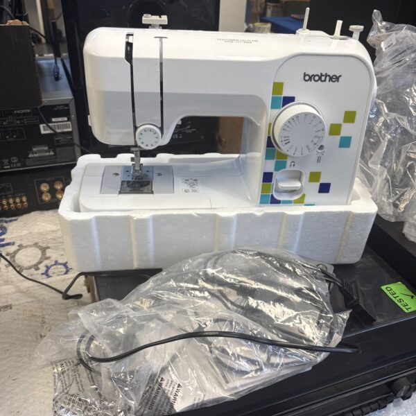 Brother LS14S sewing machine with controller, vintage and portable.