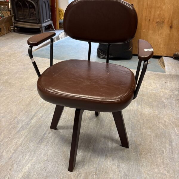 Vintage brown faux leather swivel desk chair.