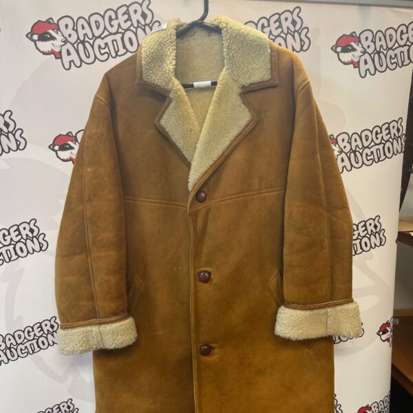 Vintage brown suede jacket with shearling lining.