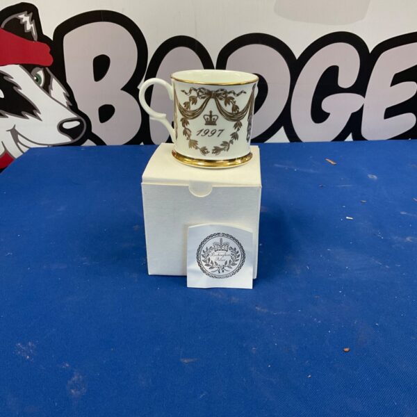 Buckingham Palace 1997 commemorative teacup with presentation box.