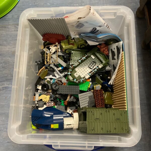 Assorted building bricks lot with Lego compatible pieces.