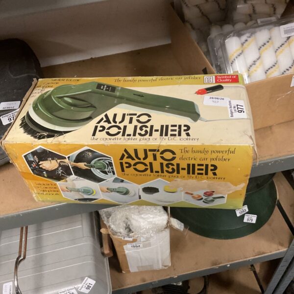 Vintage car polisher in original packaging, 12V auto detailing tool.