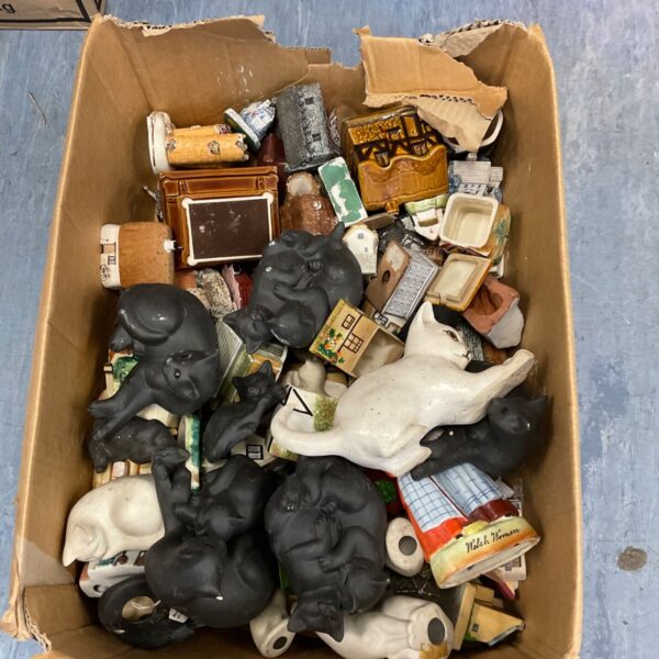 Large collection of vintage cat and animal ornaments displayed in a box.