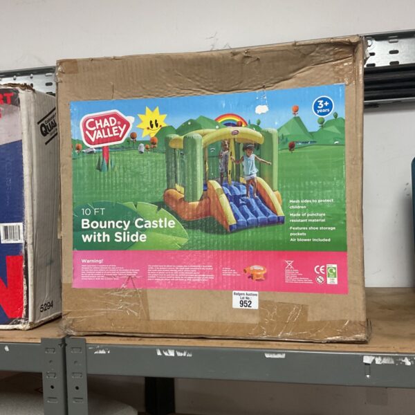 Chad Valley 10ft bouncy castle with slide, colourful garden toy.