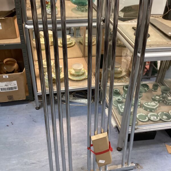 Chrome heated towel rail for bathroom, 68cm x 120cm.
