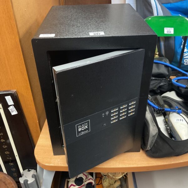 Black Chubb Black Box safe with key lock and multiple ports.