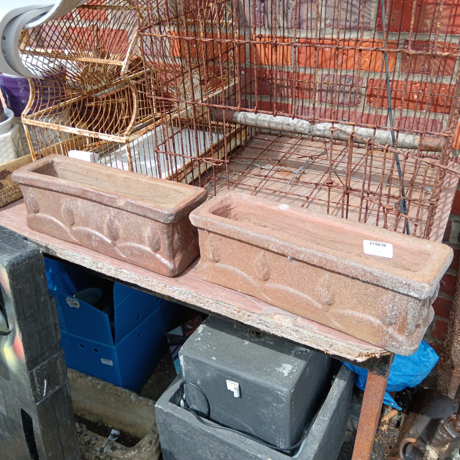 Pair of vintage clay trough planters for garden use.