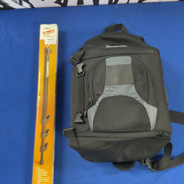 Cobra 2500 monopod with a Lowepro camera bag, photography equipment.