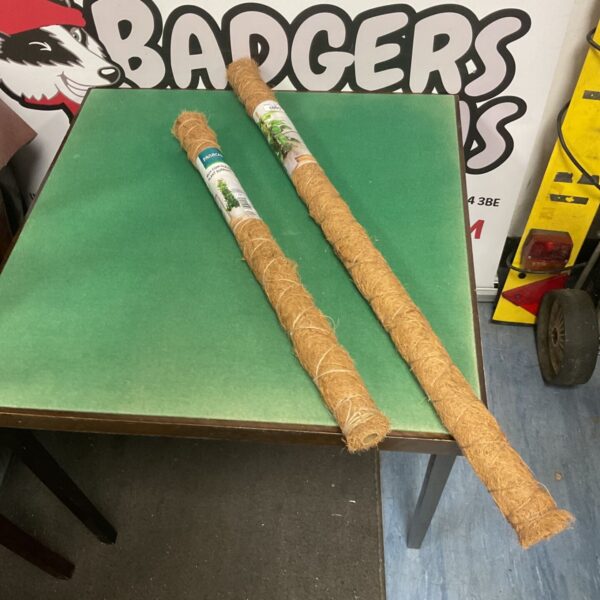 Two rolls of natural coir plant support poles for garden use.