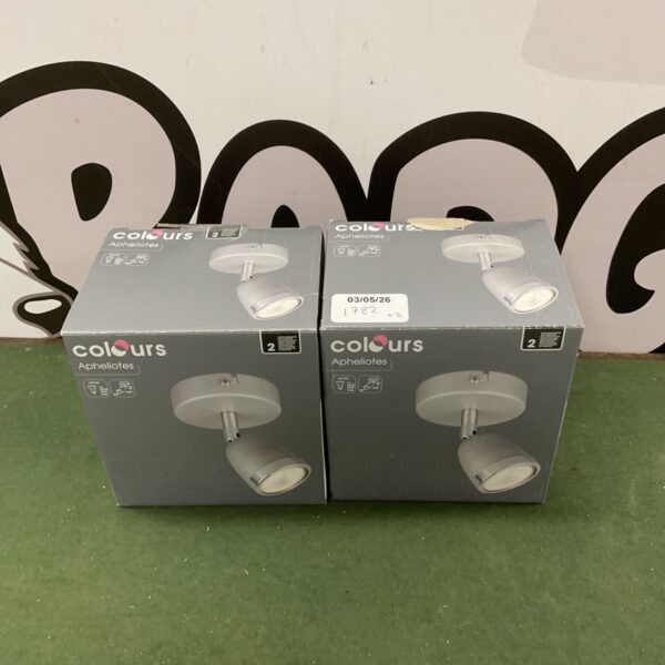 Two vintage Colours Apheliotes ceiling spot lamps with adjustable heads.
