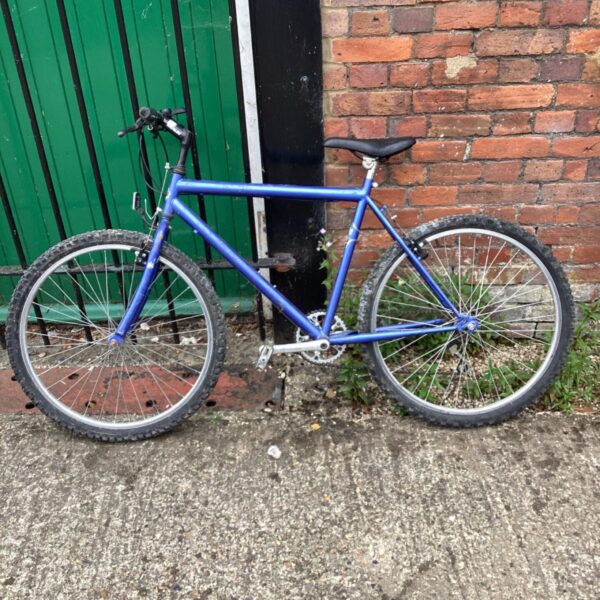 Vintage blue Concept mountain bike with 26-inch wheels.