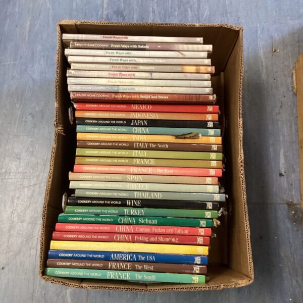 Mixed lot of vintage and modern cookery books for kitchen inspiration.