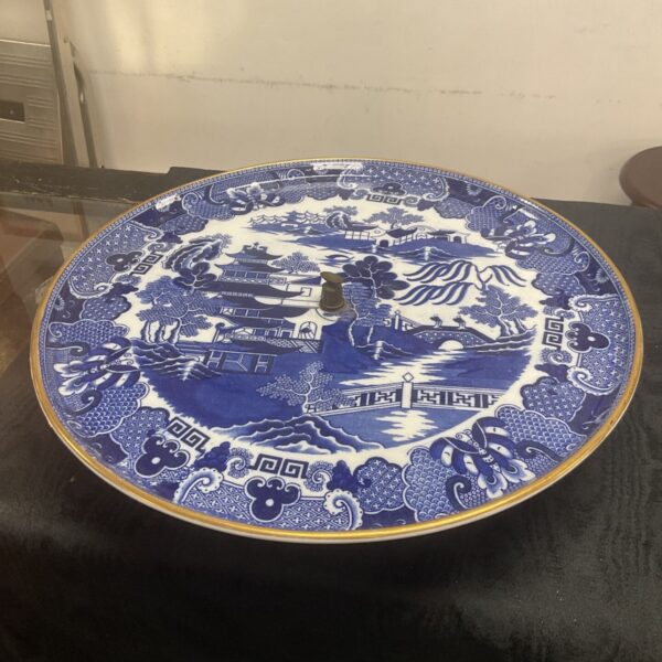 Antique Copeland blue willow platter with detailed landscape design.