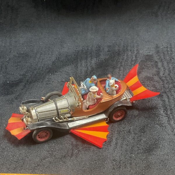 Vintage Corgi Chitty Chitty Bang Bang diecast car with figures.