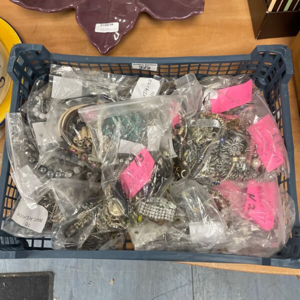 Tray of assorted costume jewellery including necklaces and bracelets.