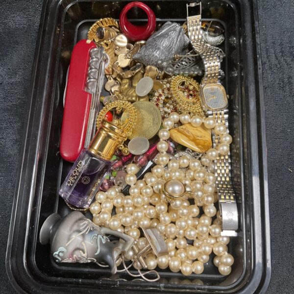 Costume jewellery tray with a Victorinox Swiss Army knife included.