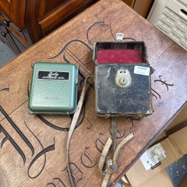 Vintage Cowley Automatic Level surveying instrument with patina.