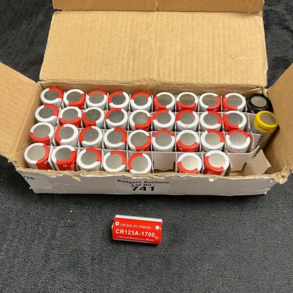 Box of Cr123A lithium 3v batteries for flashlights and cameras.