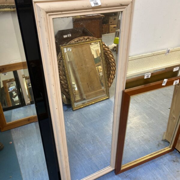 Antique cream full length mirror with wooden frame.