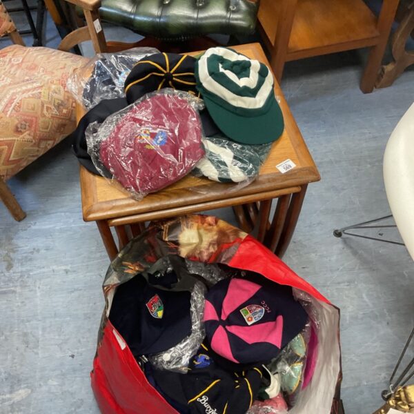 Job lot of vintage cricket hats and caps for collectors.
